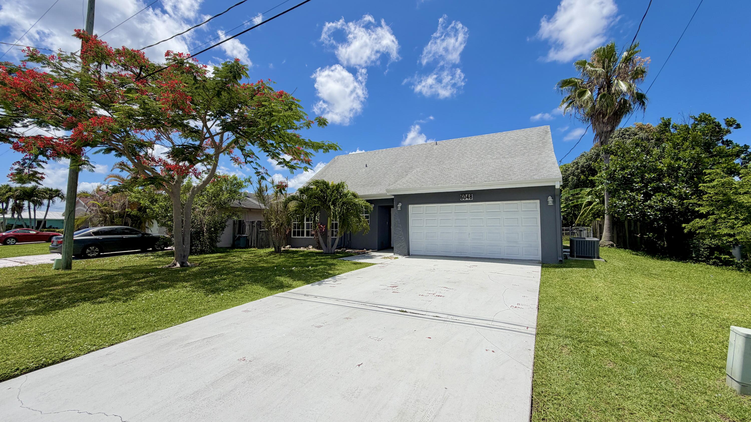 6048 Garrett Street Jupiter, FL 33458 - Photo 2 of 101 IMG_8827
