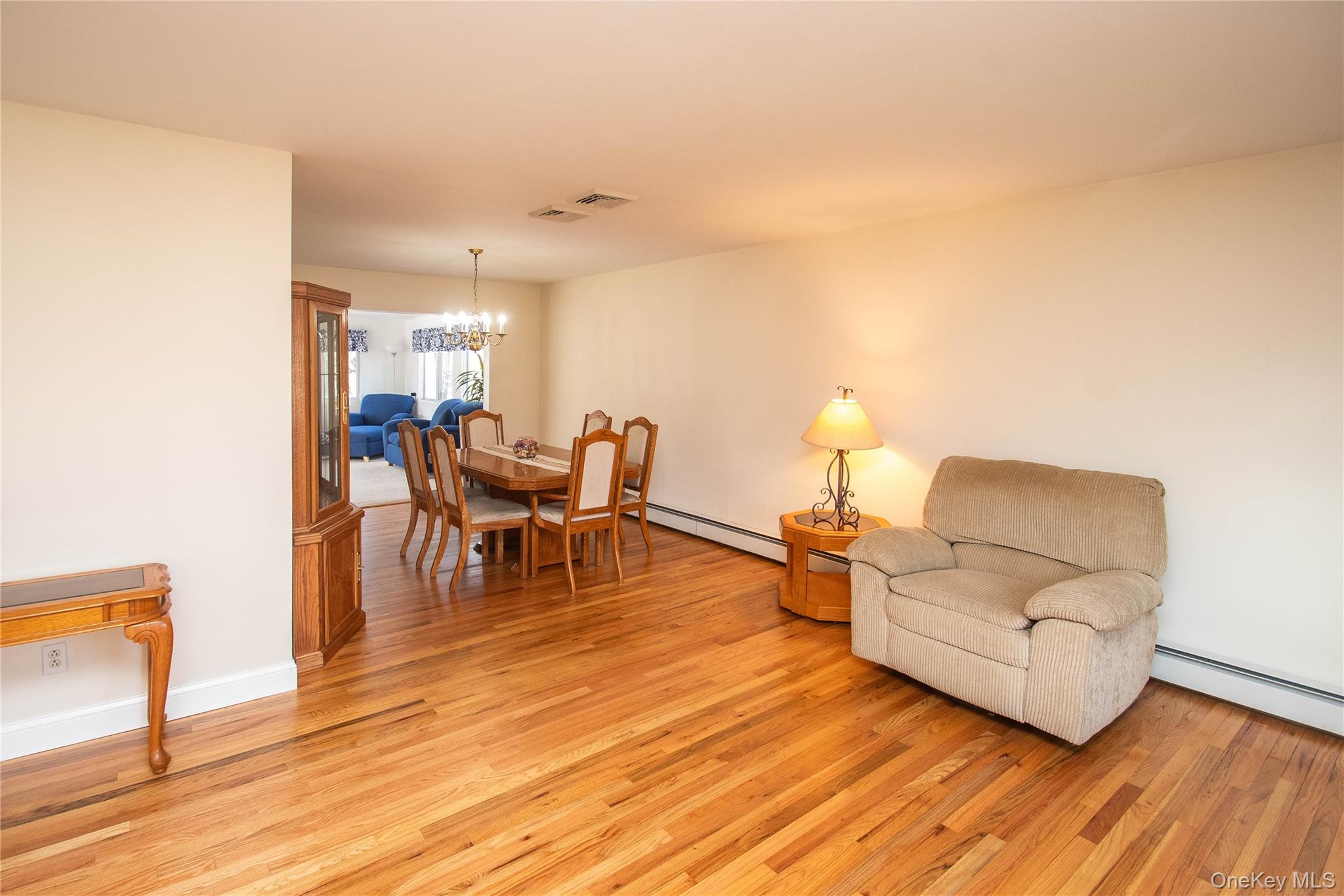 24 Montfort Road Wappingers Falls, NY 12590 - Photo 12 of 45 a living room with furniture and a wooden floor