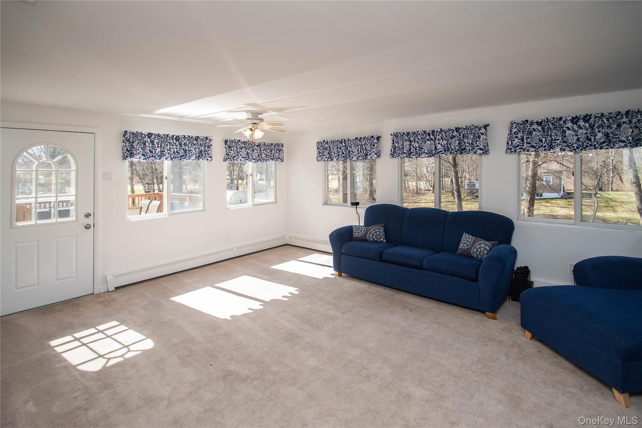 24 Montfort Road Wappingers Falls, NY 12590 - Photo 14 of 45 a living room with furniture and a window