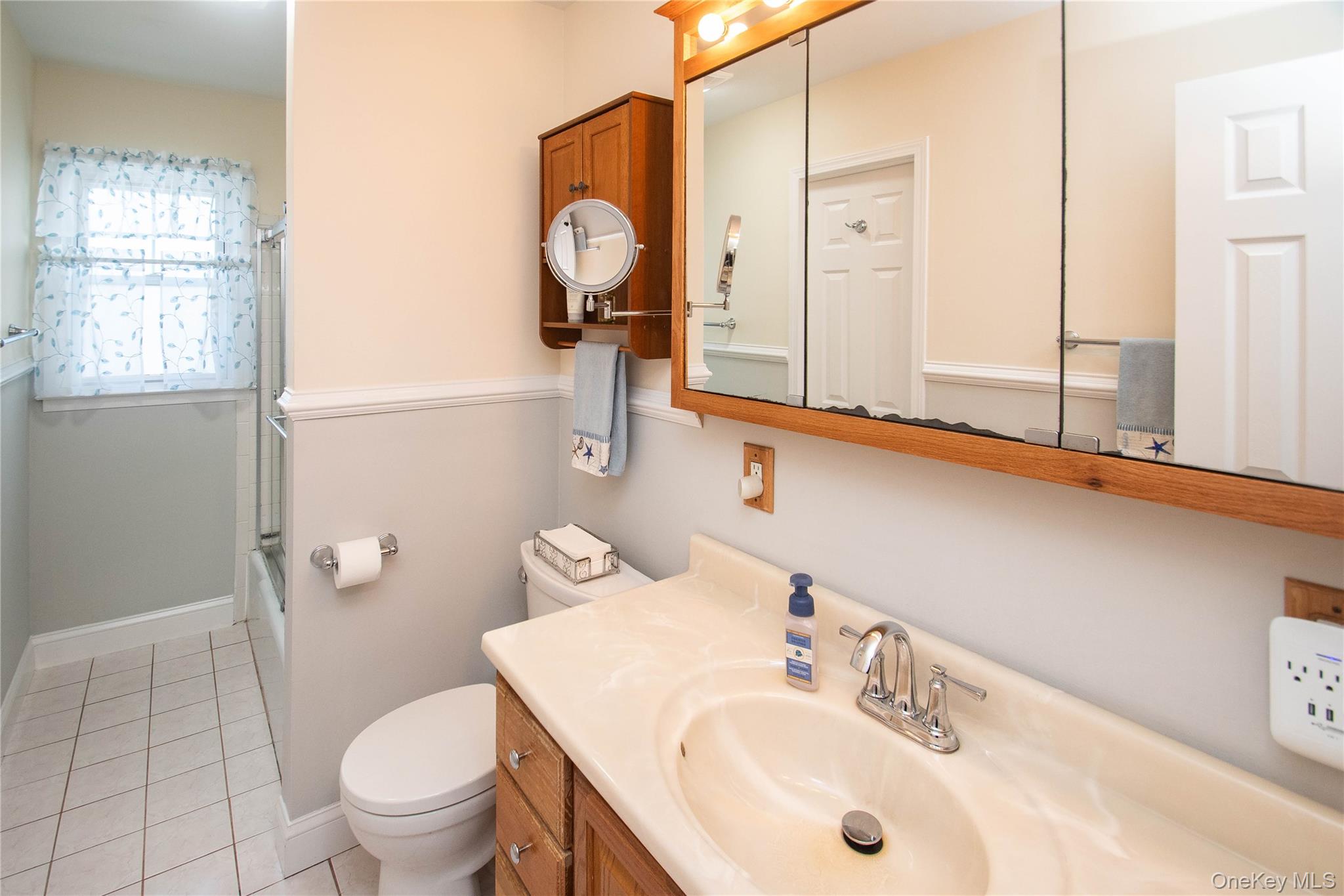 24 Montfort Road Wappingers Falls, NY 12590 - Photo 18 of 45 a bathroom with a sink toilet and mirror