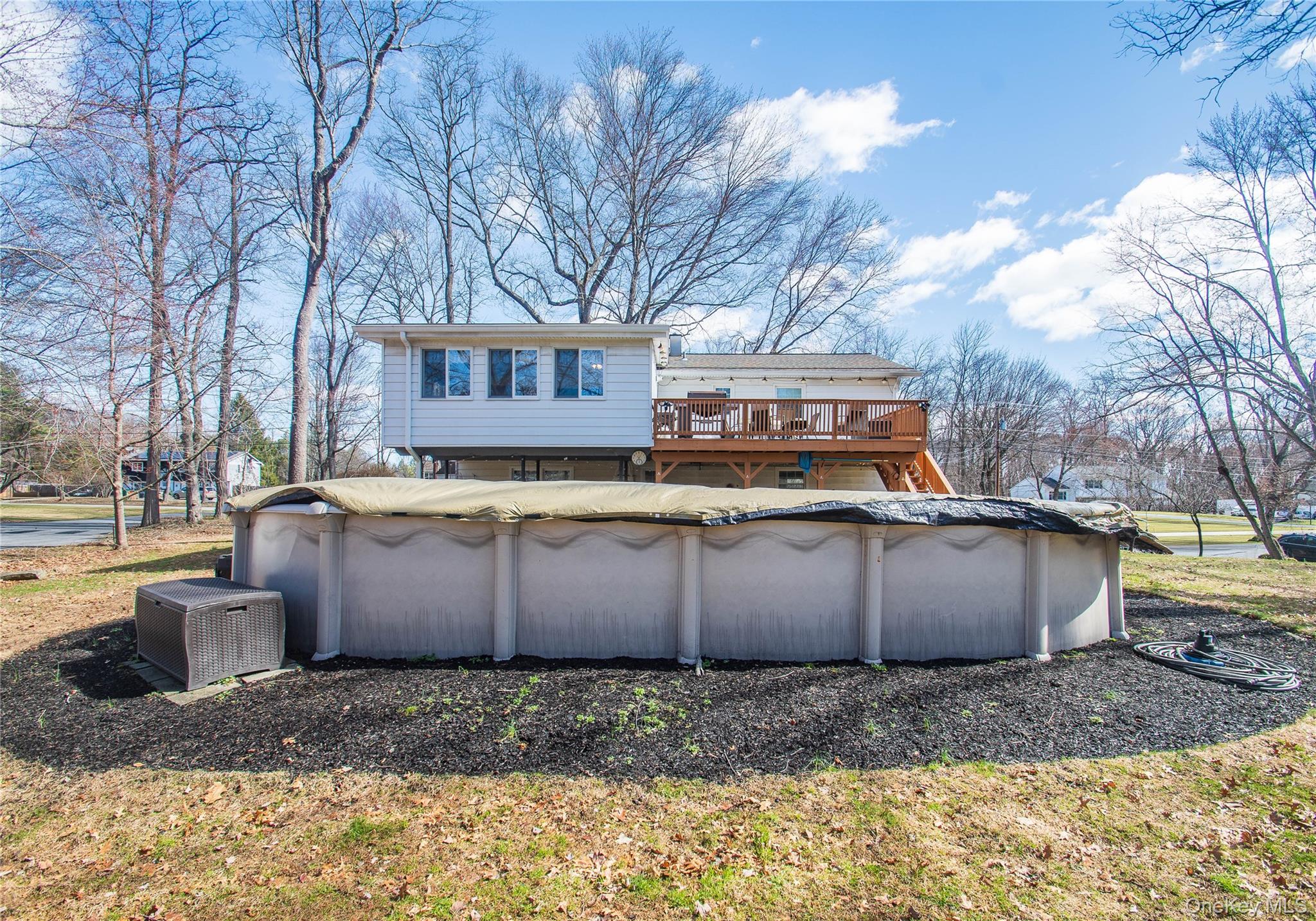 24 Montfort Road Wappingers Falls, NY 12590 - Photo 41 of 45 a view of a house with a yard covered in snow