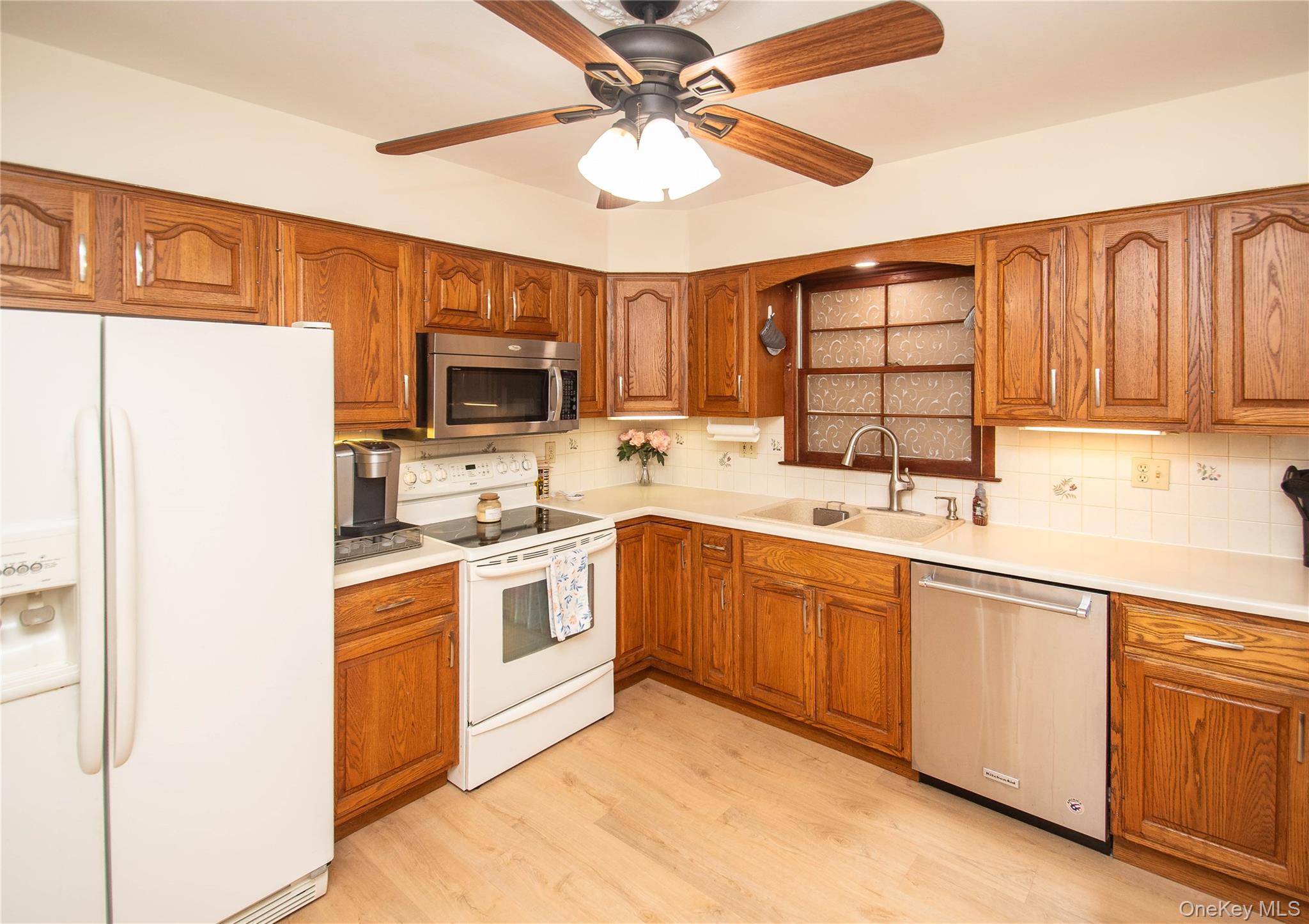 24 Montfort Road Wappingers Falls, NY 12590 - Photo 5 of 45 a kitchen with granite countertop a sink stainless steel appliances and cabinets