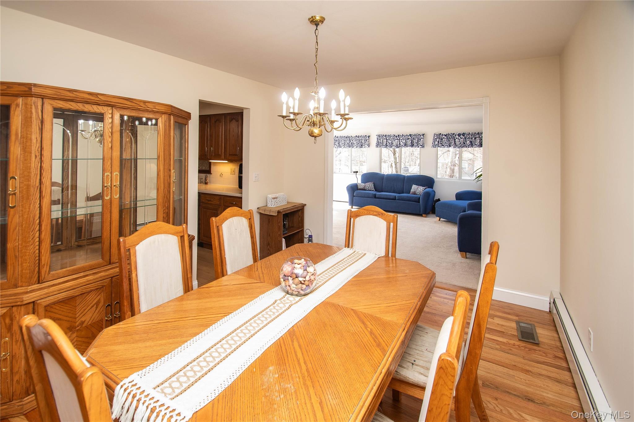 24 Montfort Road Wappingers Falls, NY 12590 - Photo 8 of 45 a bedroom with bed and a chandelier