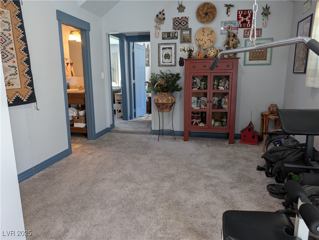 327 High Street Pioche, NV 89043 - Photo 19 of 27 Upstairs Family Room featuring carpet and baseboards