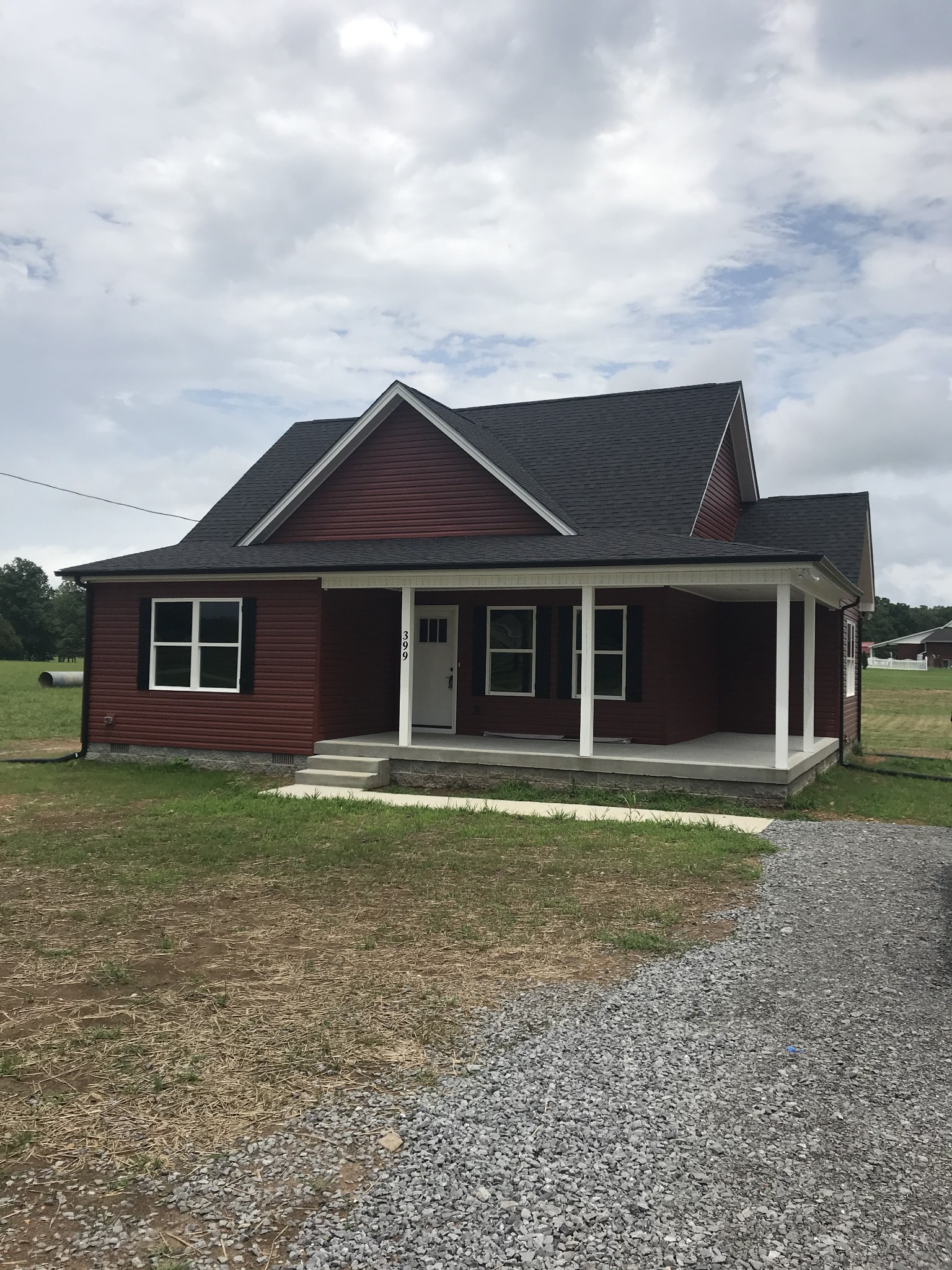 399 Pruett Road Dickson, TN 37055 - Photo 6 of 6 a front view of a house with a garden