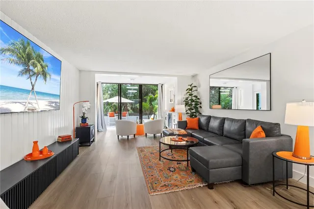 a bathroom with a shower a toilet and a sink