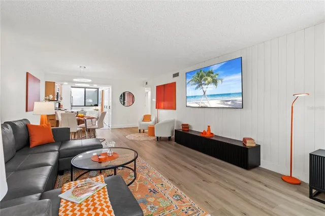 a spacious bedroom with a bed and a window