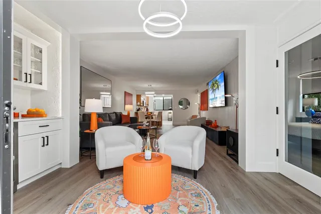 a view of swimming pool with a yard and lake view