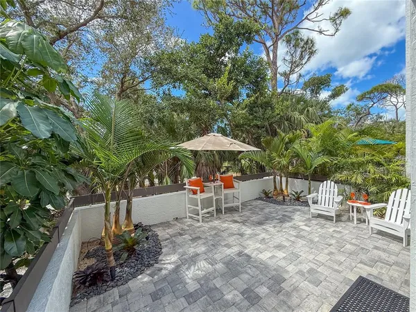 a view of green field with lake view
