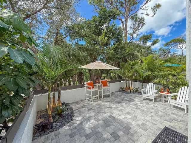 a view of green field with lake view