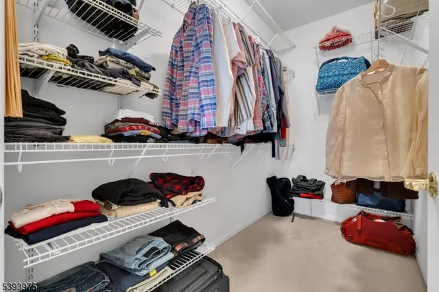 a room with lots of different colored cloths