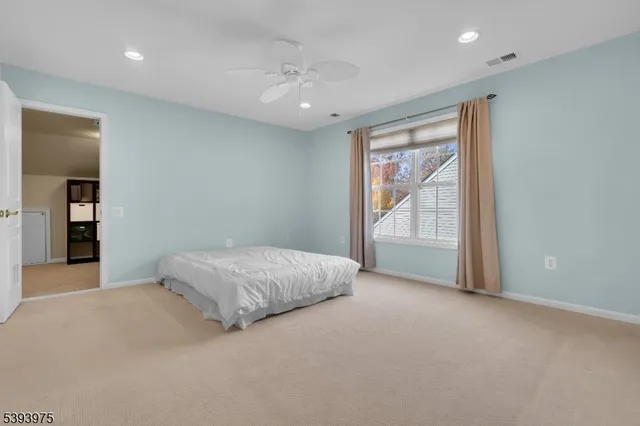 a view of an empty room with shelves