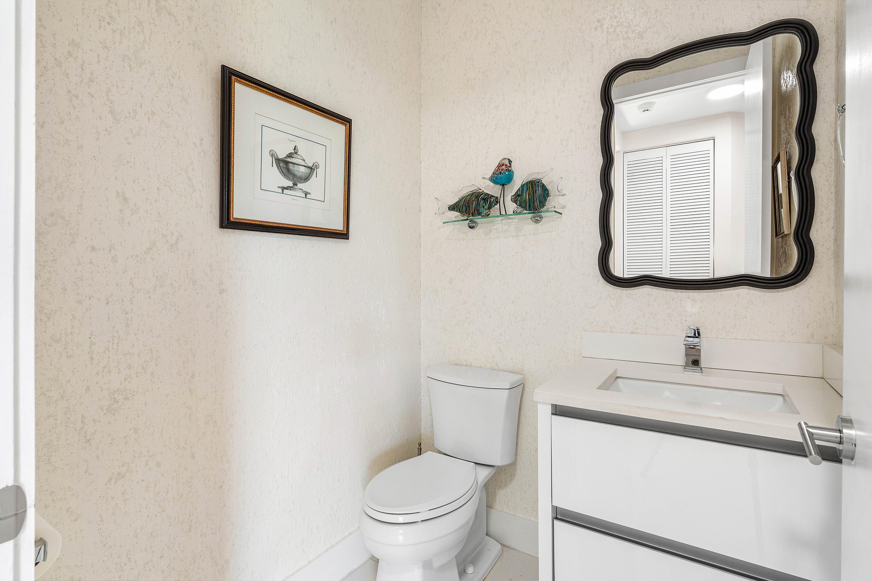 17652 Ashbourne Lane, Unit B Boca Raton, FL 33496 - Photo 32 of 45 Powder Bathroom