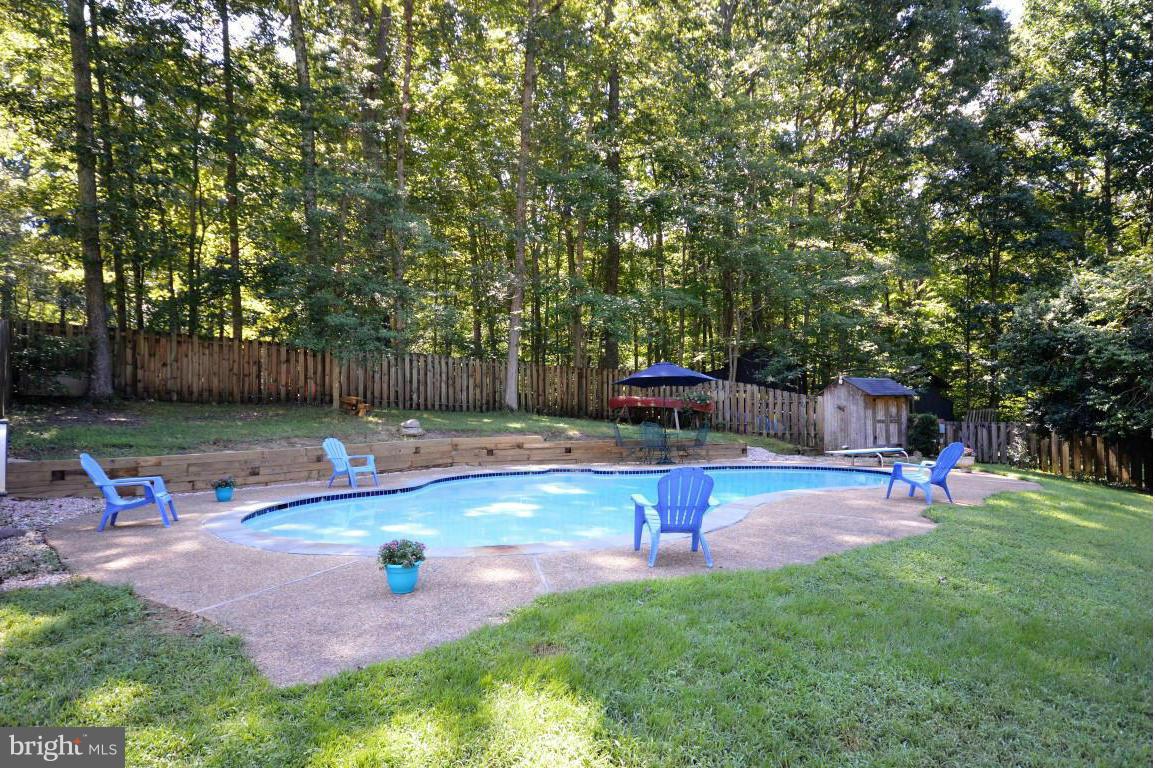 8056 Stillbrooke Road Manassas, VA 20112 - Photo 3 of 30 In Ground Pool In Fenced Yard