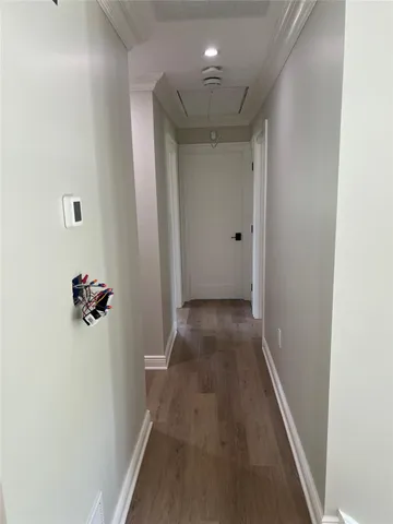 a kitchen with a sink a counter top space stainless steel appliances and a window