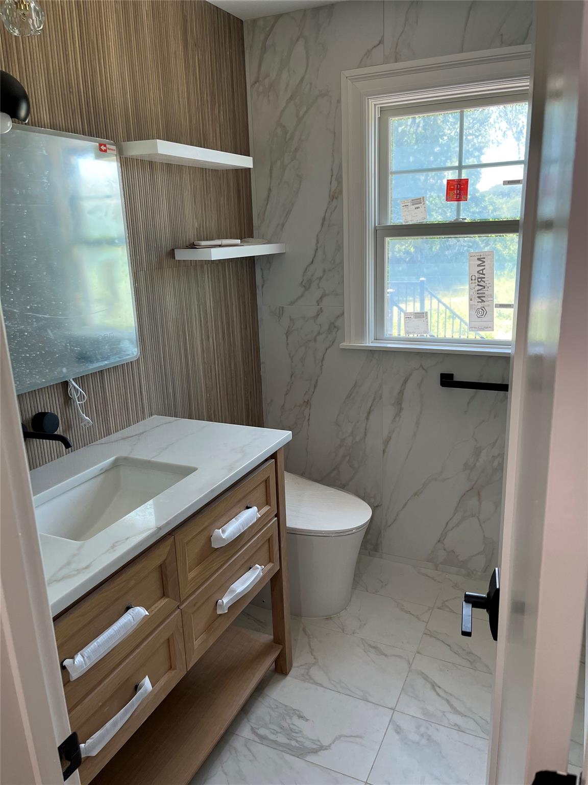 4 Glen Court Poughkeepsie, NY 12603 - Photo 20 of 32 a bathroom with a toilet sink and window