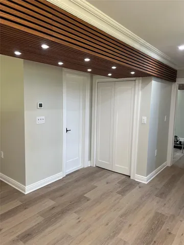 a bathroom with a sink a toilet and a window