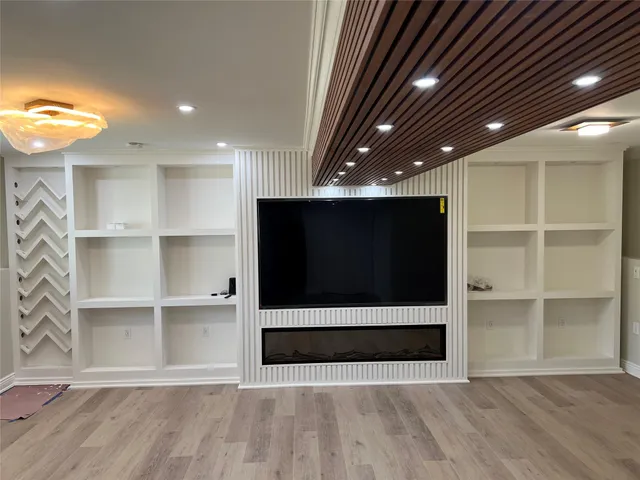a view of a hallway with washer and dryer