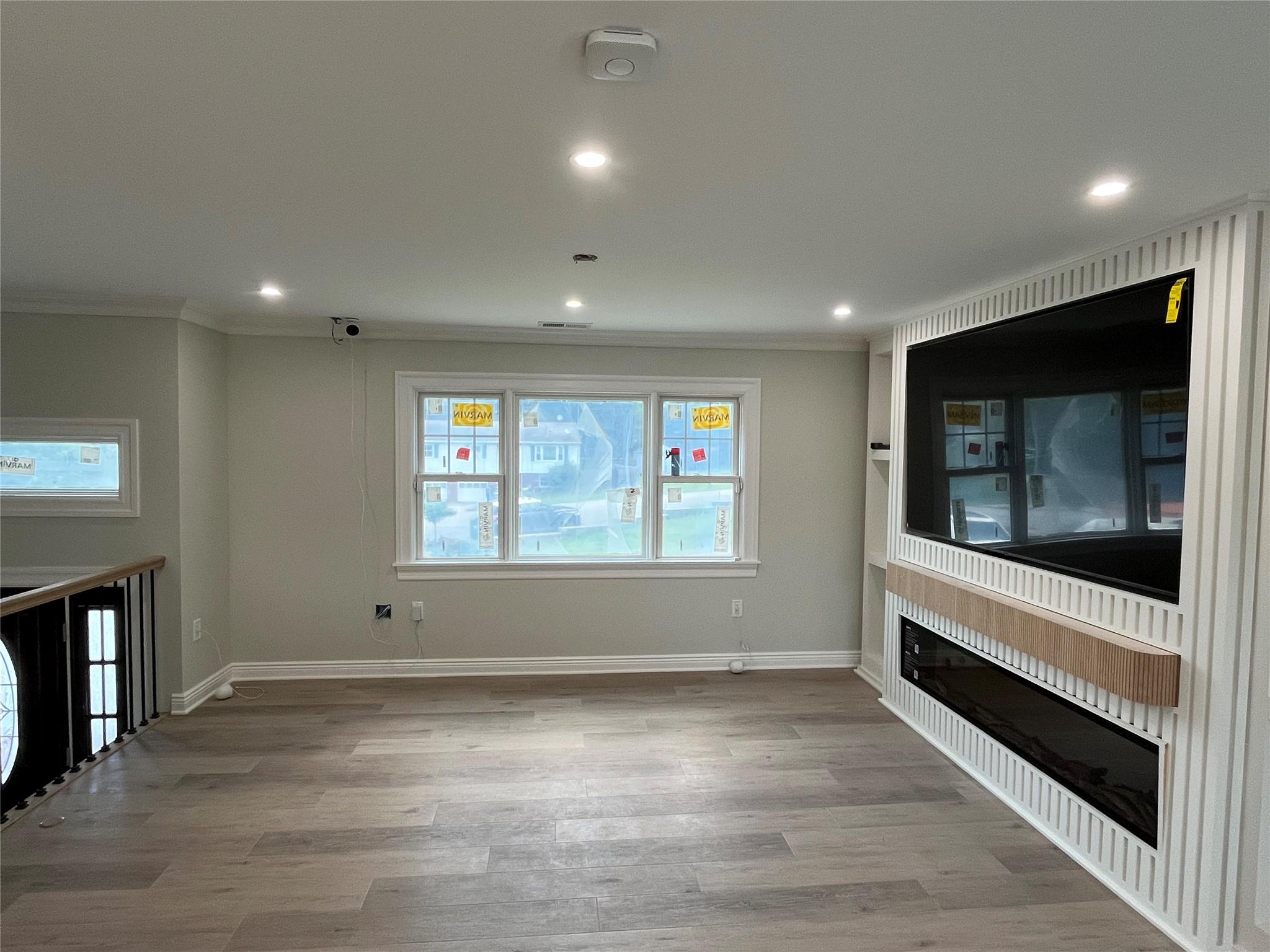 4 Glen Court Poughkeepsie, NY 12603 - Photo 5 of 32 a view of room with window and wooden floor