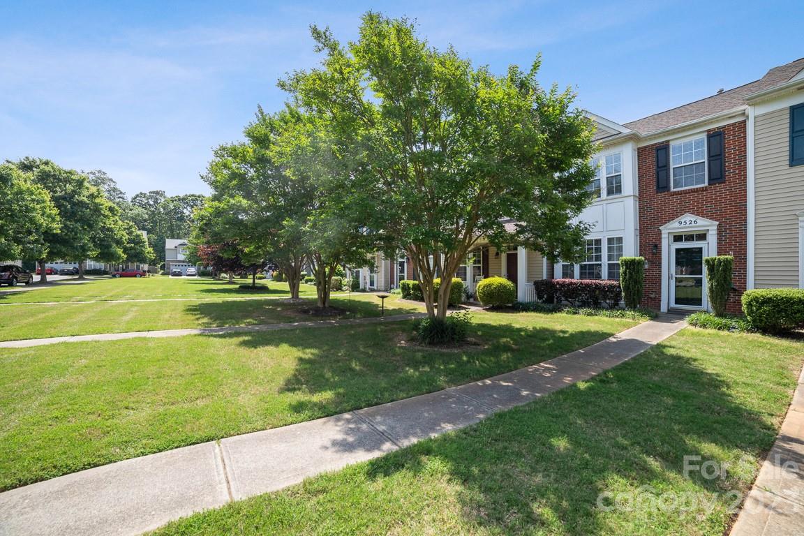 9526 Inglenook Lane Huntersville, NC 28078 - Photo 1 of 20 a view of a house with a big yard