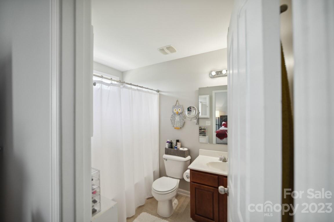 9526 Inglenook Lane Huntersville, NC 28078 - Photo 17 of 20 a bathroom with a sink toilet and shower
