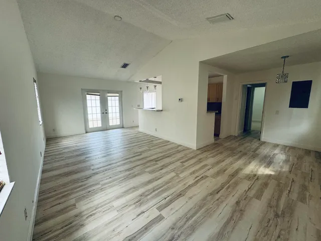 a view of livingroom with hardwood floor and window