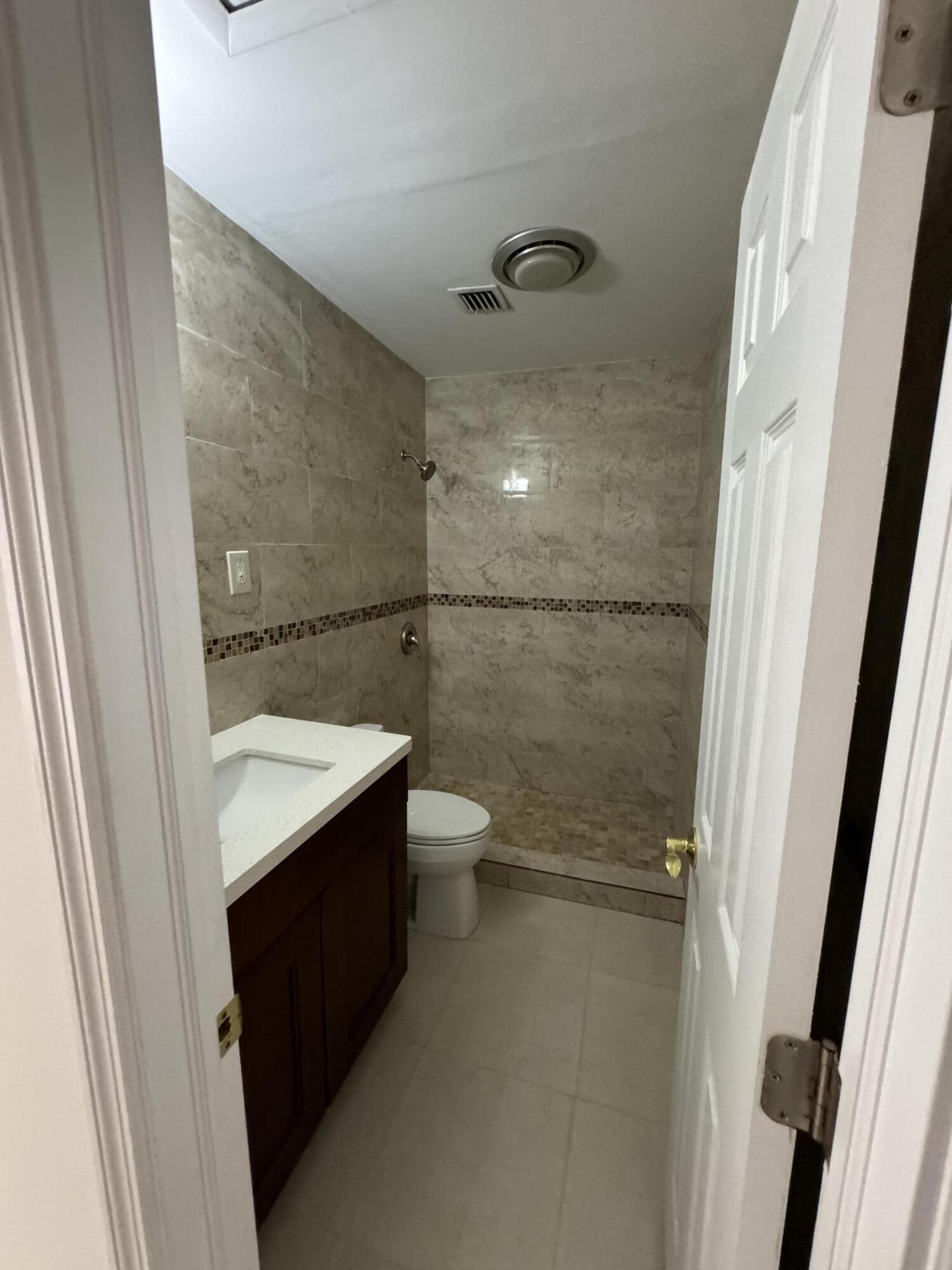 10317 Pippin Lane Royal Palm Beach, FL 33411 - Photo 5 of 6 10317 Guest Restroom