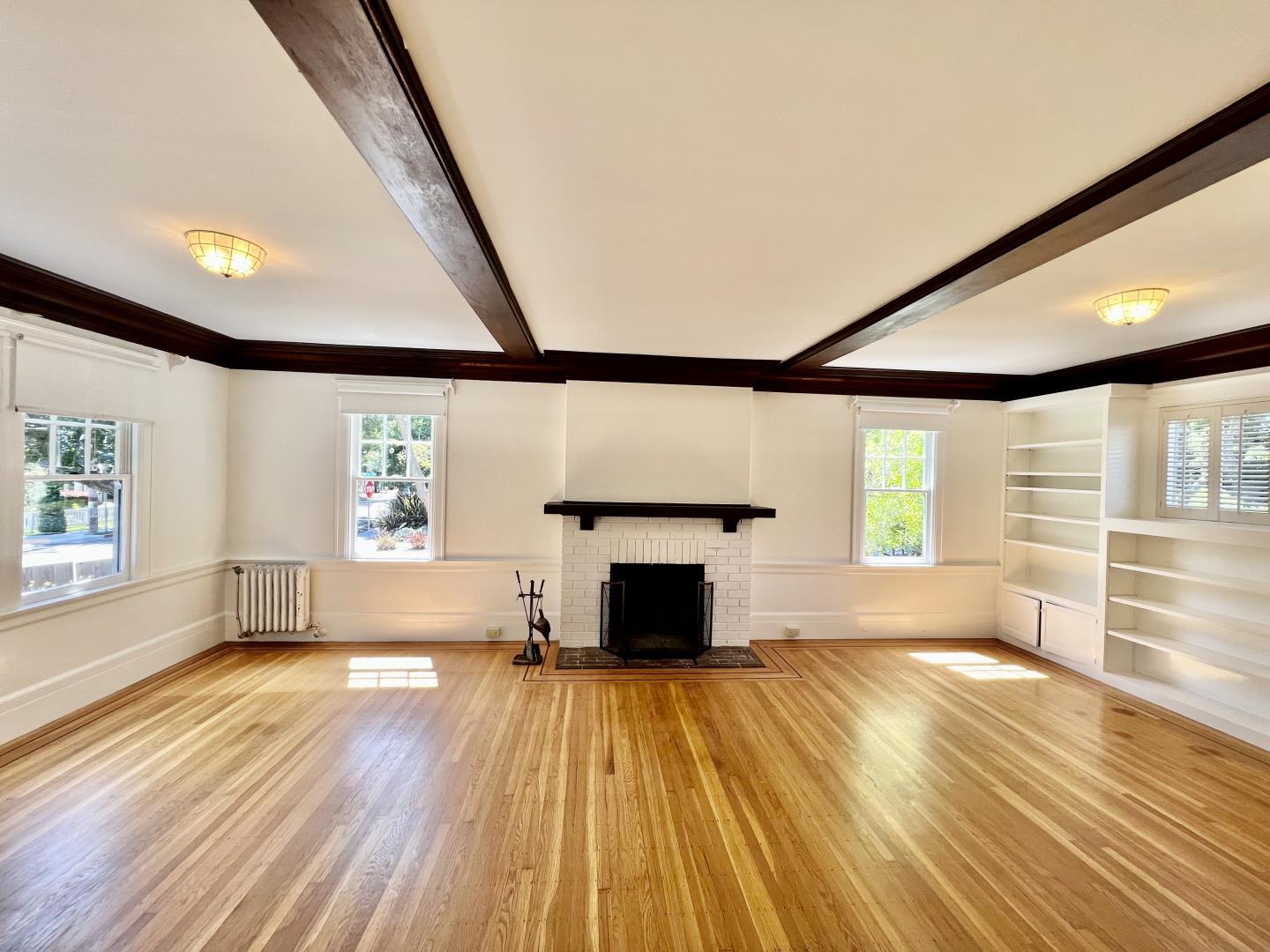 1616 Adeline Drive Burlingame, CA 94010 - Photo 1 of 31 an empty room with wooden floor and windows