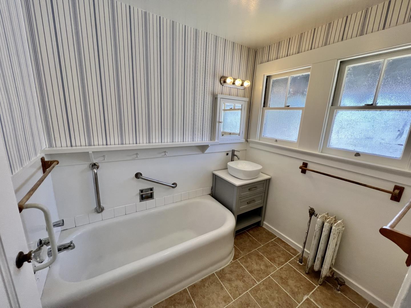 1616 Adeline Drive Burlingame, CA 94010 - Photo 21 of 31 a bathroom with a bathtub and a sink