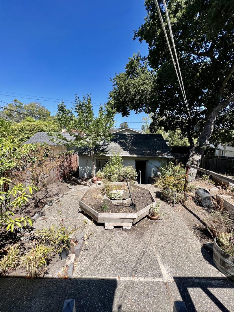 1616 Adeline Drive Burlingame, CA 94010 - Photo 31 of 31 a view of a backyard with plants and a patio