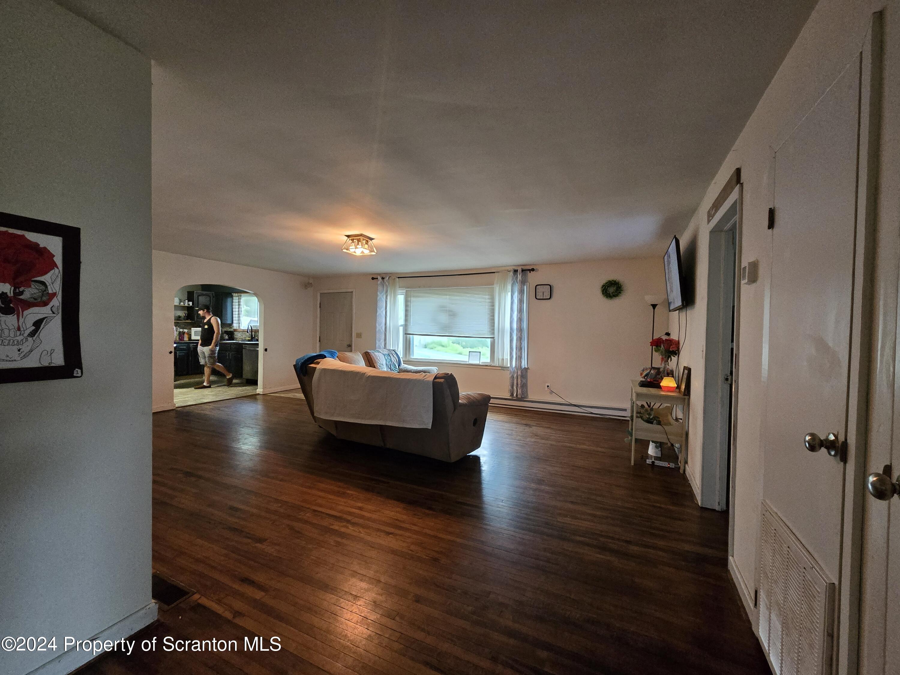 1609 State Rte 3005 Meshoppen, PA 18630 - Photo 12 of 18 a living room with furniture and a wooden floor