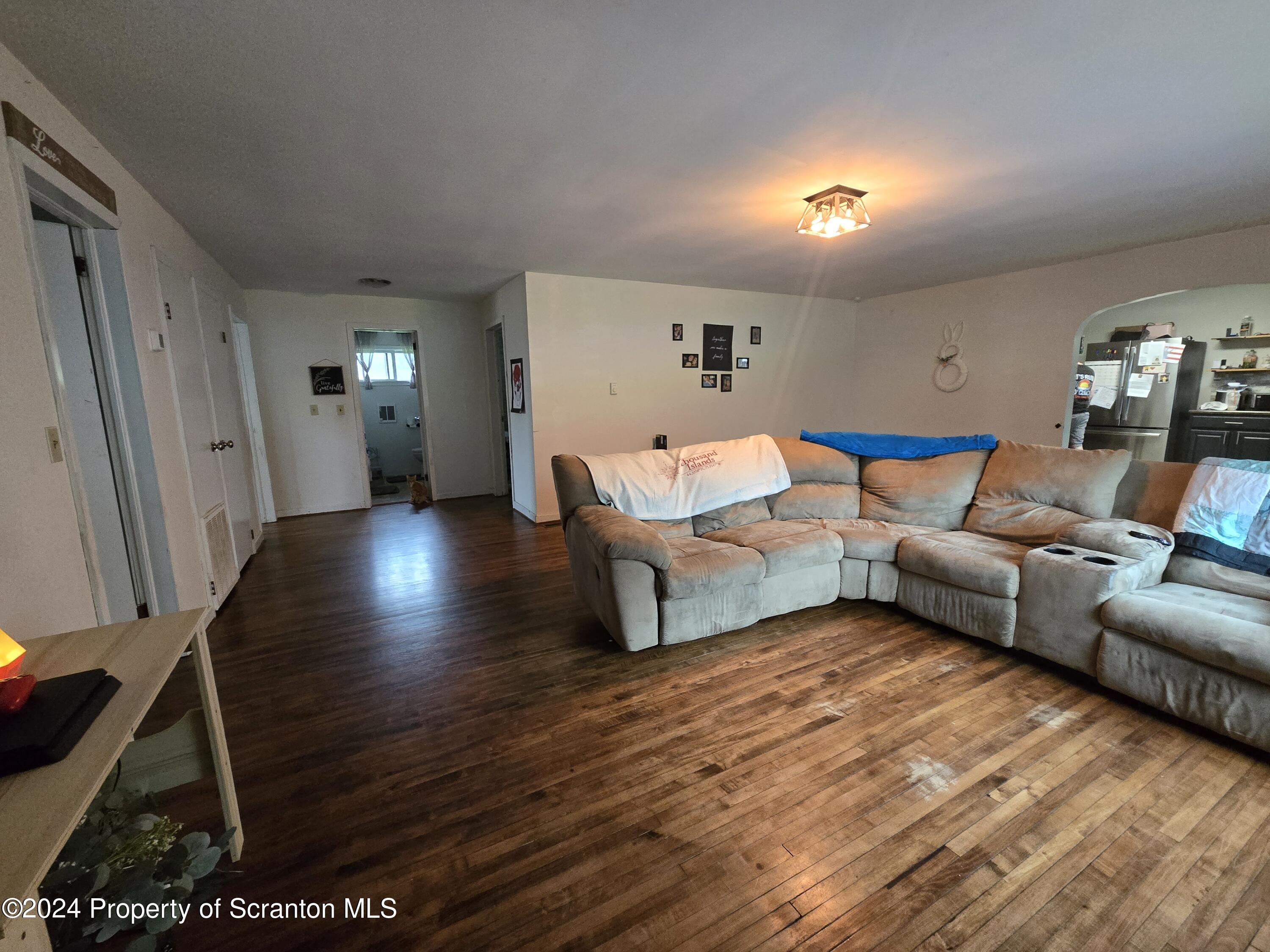 1609 State Rte 3005 Meshoppen, PA 18630 - Photo 13 of 18 a living room with furniture and a wooden floor