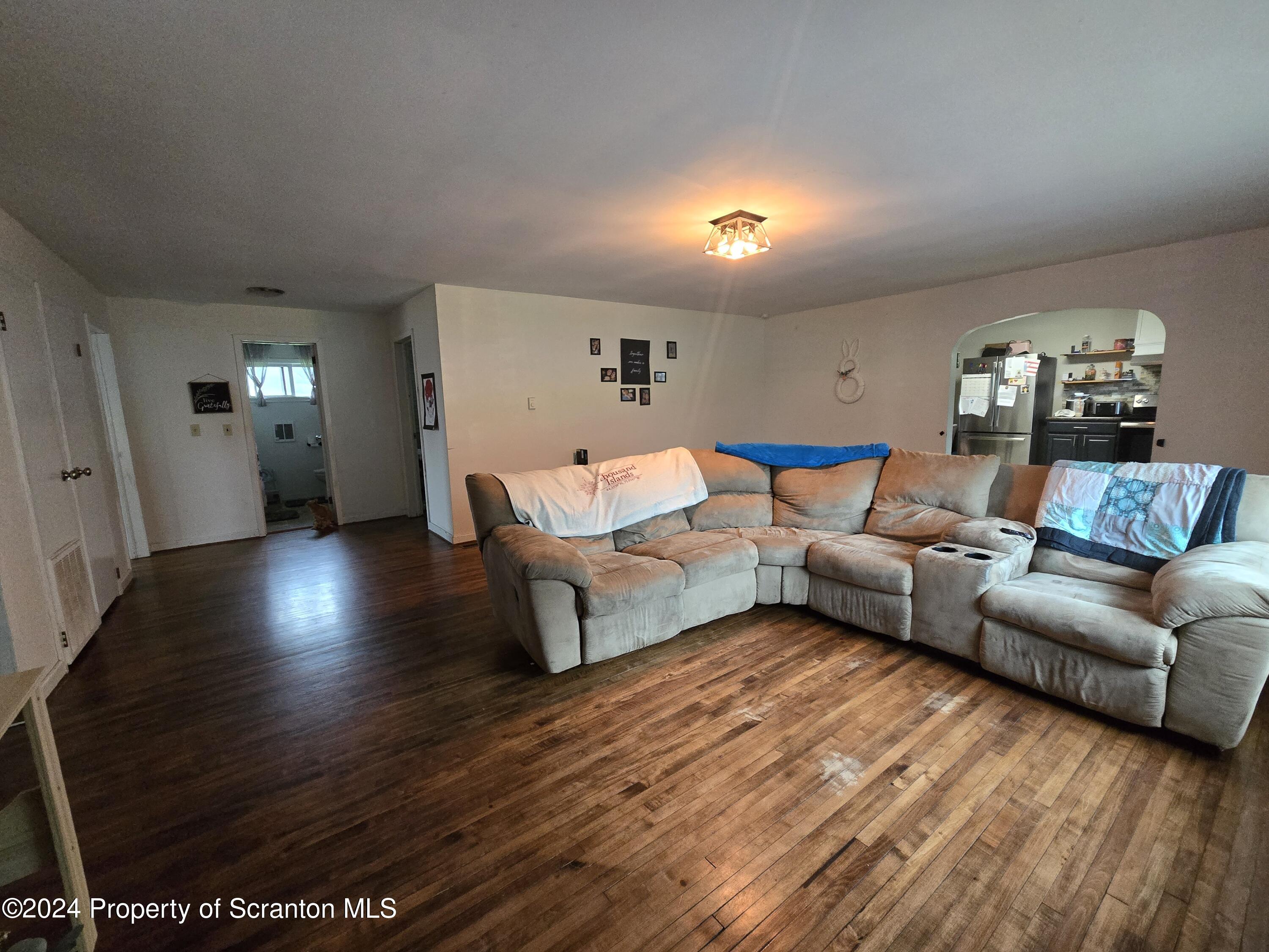 1609 State Rte 3005 Meshoppen, PA 18630 - Photo 14 of 18 a living room with furniture and a wooden floor
