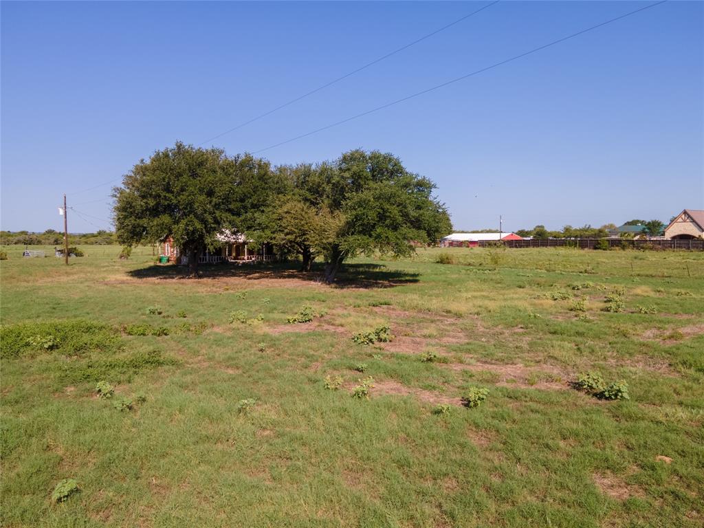 0 Old Base Road Rhome, TX 76078 - Photo 13 of 27 a view of a field with an ocean