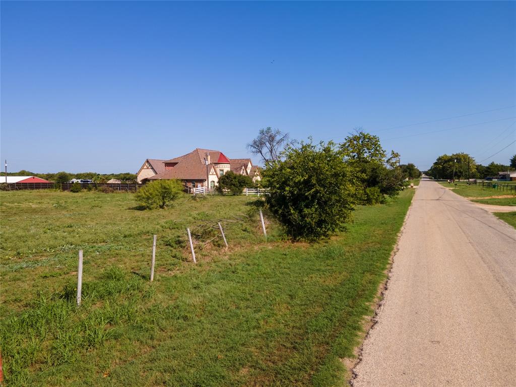 0 Old Base Road Rhome, TX 76078 - Photo 15 of 27 a view of a lake with a big yard