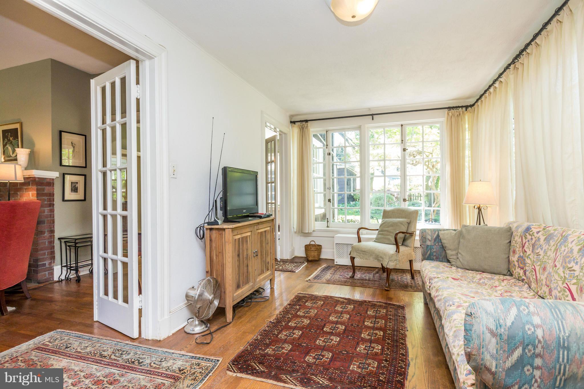 319 Taplow Road Baltimore, MD 21212 - Photo 14 of 30 HW Floors in Sunroom