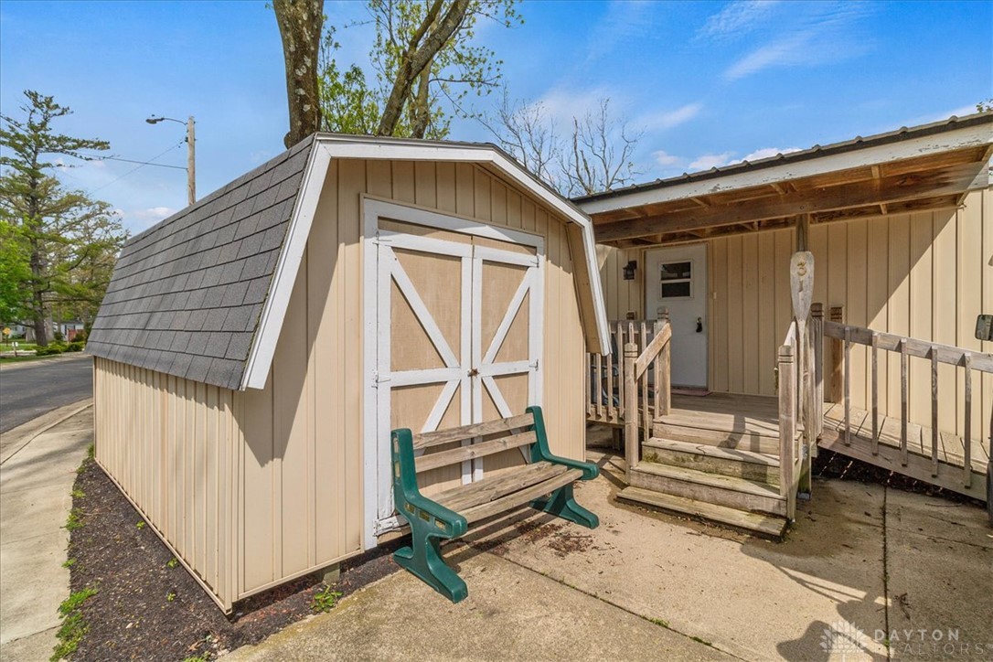 246 North Orchard Island Road Russells Point, OH 43348 - Photo 29 of 43 An inviting exterior with a shed and a welcoming ramp, offering practical convenience.