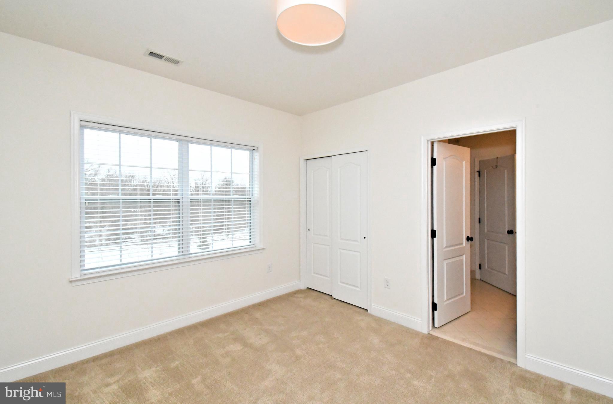 2804 Hoffs Way Warrington, PA 18976 - Photo 42 of 63 a view of an empty room with a window