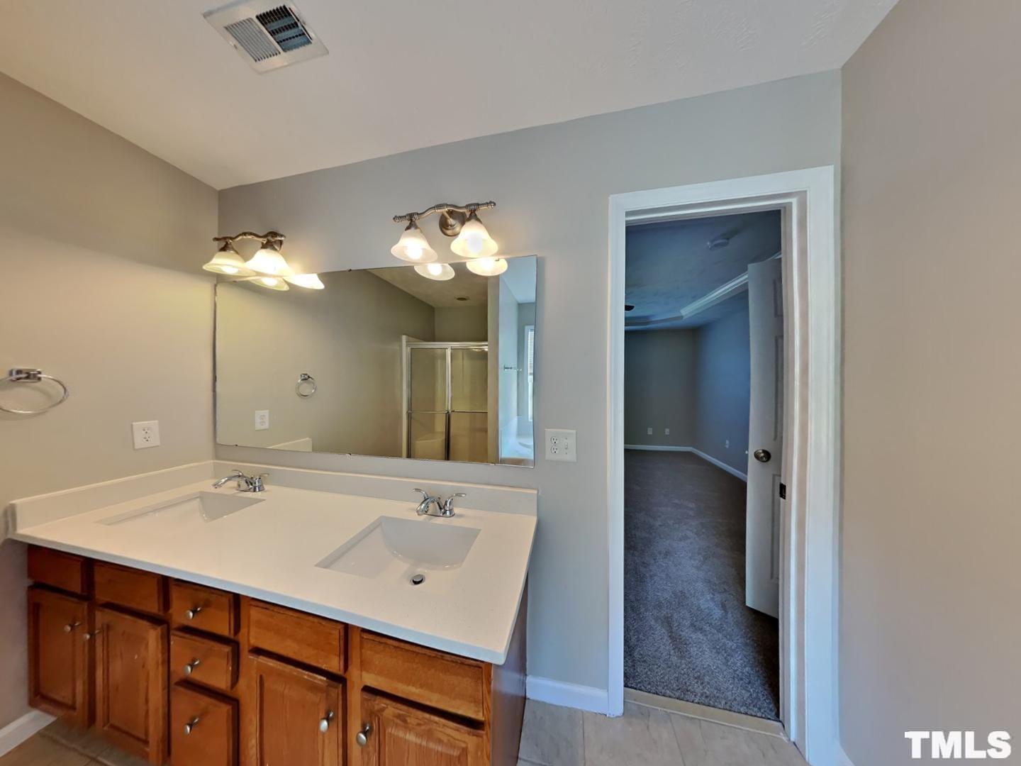 200 Lattimore Road Cameron, NC 28326 - Photo 7 of 19 a bathroom with a sink and a mirror