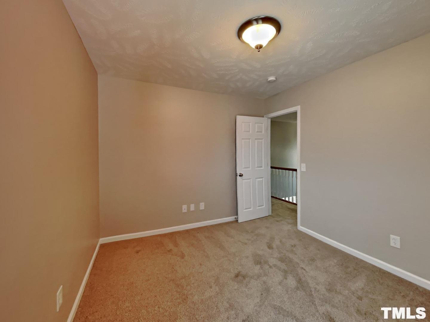 200 Lattimore Road Cameron, NC 28326 - Photo 10 of 19 an empty room with a empty space and a window