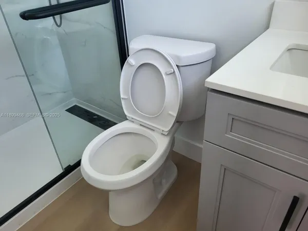 a close view of a toilet in a bathroom