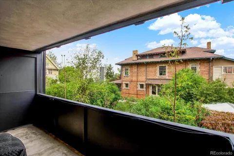 a view of a balcony with an outdoor space