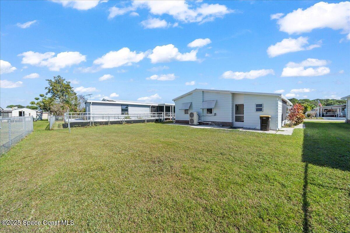 1924 Big Cypress Street Northeast Palm Bay, FL 32905 - Photo 27 of 29 a large room with lots of table and chairs