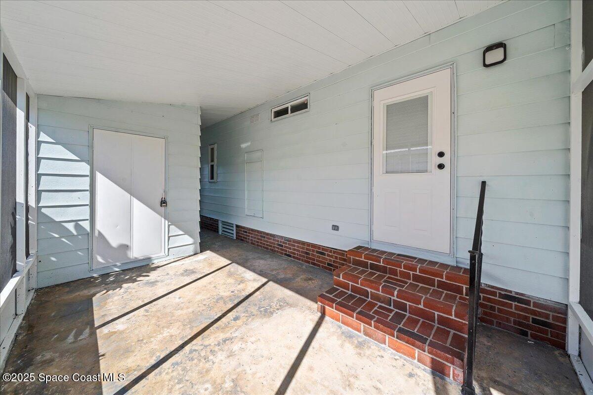 1924 Big Cypress Street Northeast Palm Bay, FL 32905 - Photo 5 of 29 a view of a bedroom