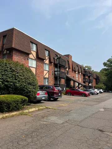 a car parked in front of a building