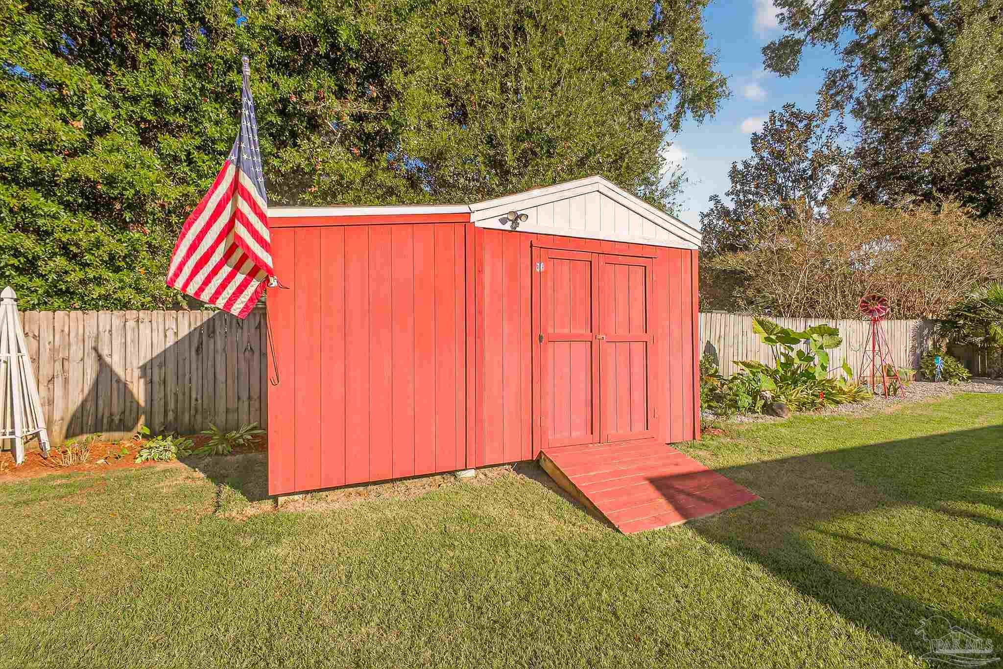 4650 Ridge Pointe Drive Pace, FL 32571 - Photo 35 of 38 a view of backyard with green space