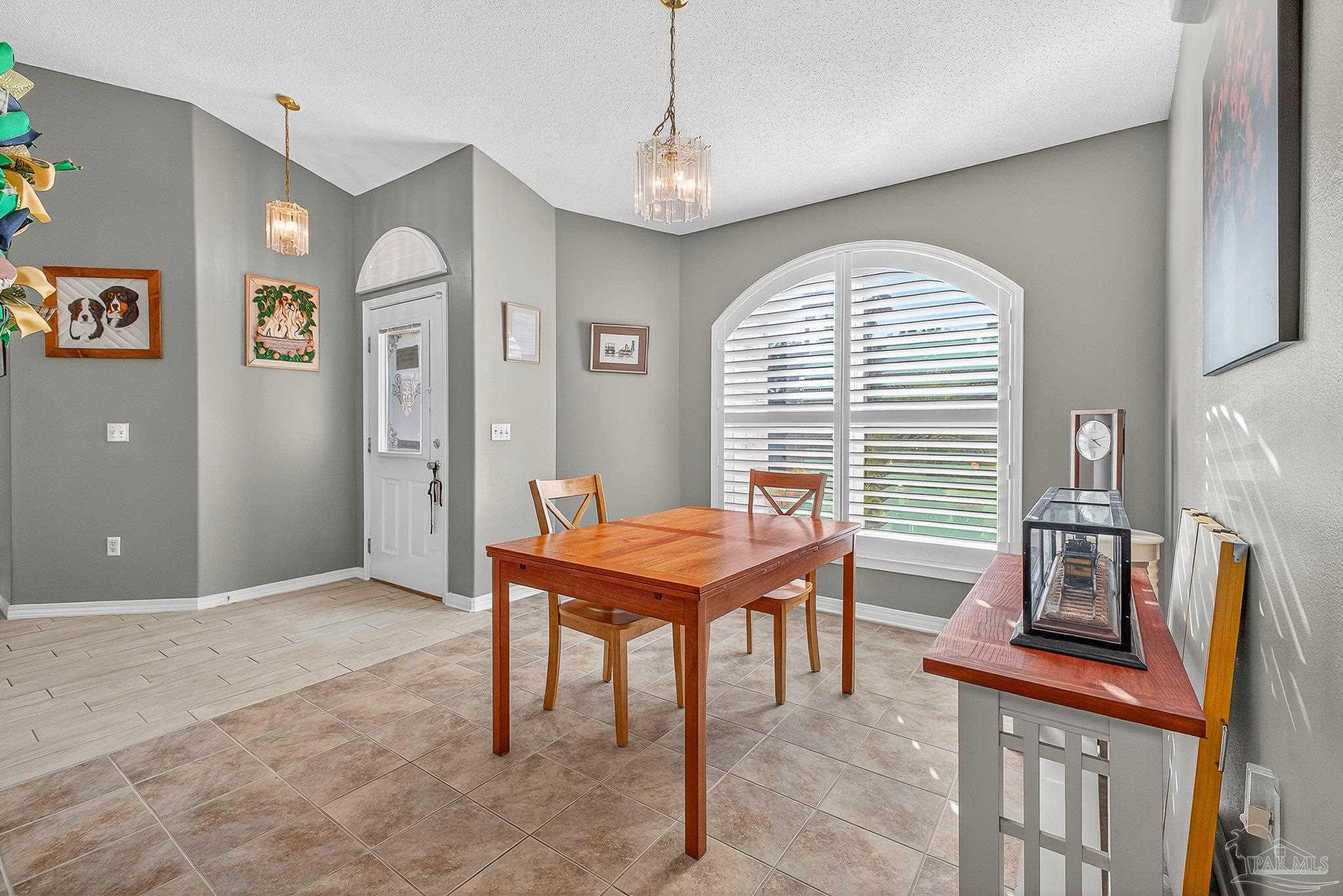 4650 Ridge Pointe Drive Pace, FL 32571 - Photo 6 of 38 a room with furniture and window