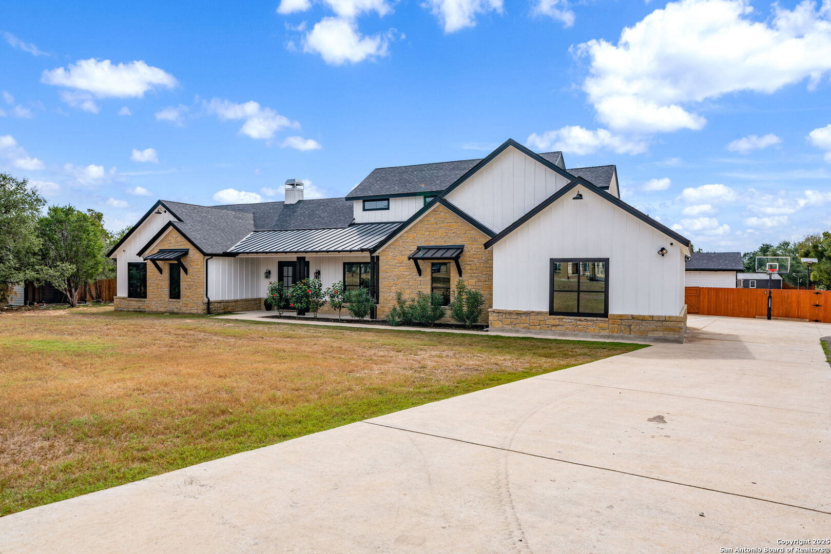1115 Meadow Stone Court Spring Branch, TX 78070 - Photo 1 of 42 a view of house and outdoor space with seating area