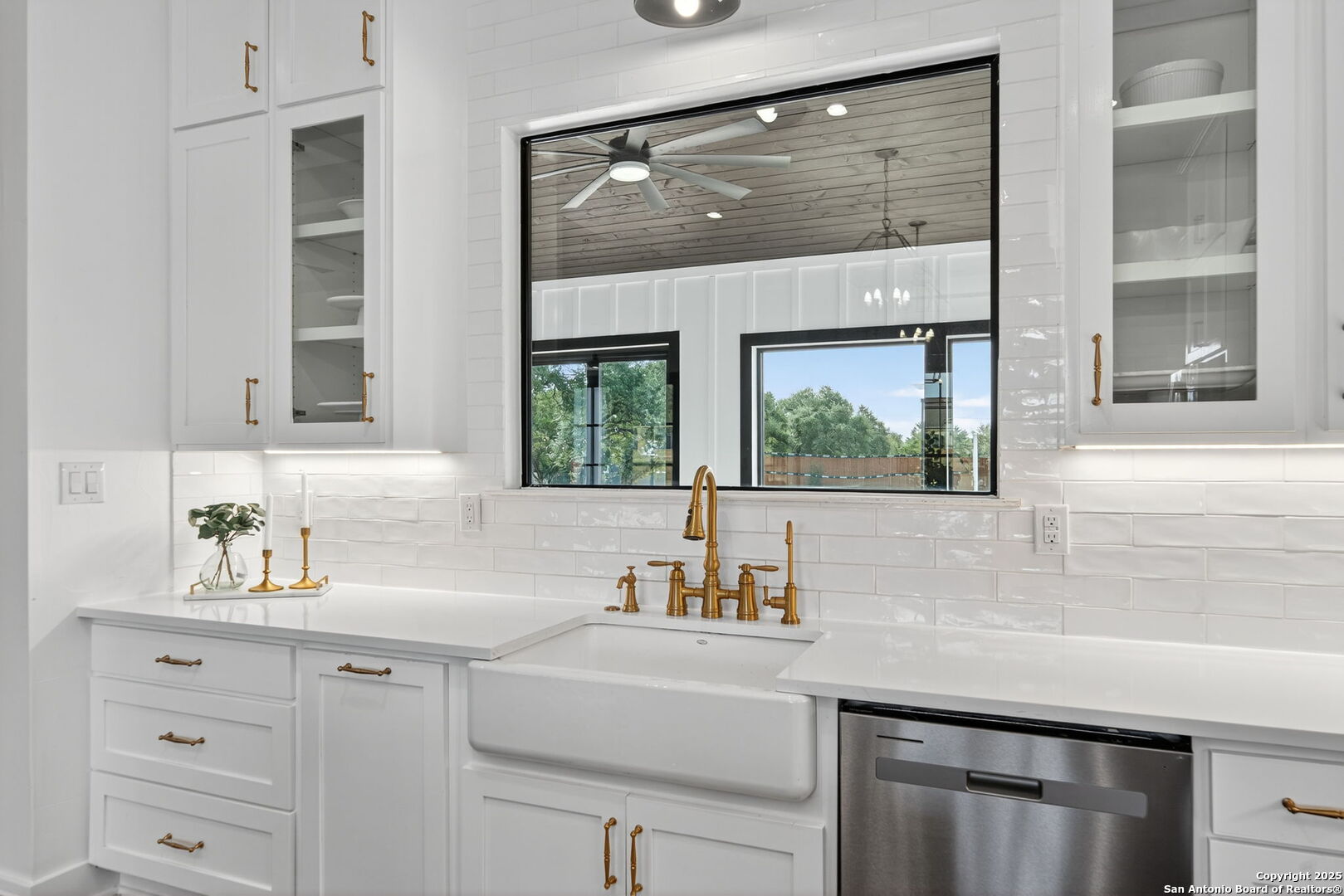 1115 Meadow Stone Court Spring Branch, TX 78070 - Photo 11 of 42 a bathroom with a sink a vanity a window and a mirror