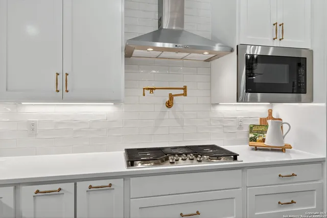 a dining room with furniture window and wooden floor